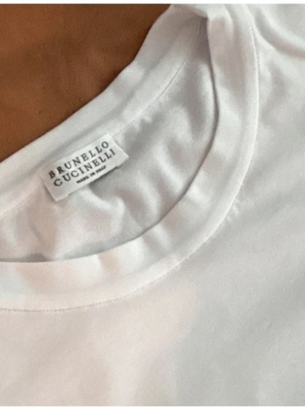 Brunello Cucinelli with original Monili signature beads on the top back.